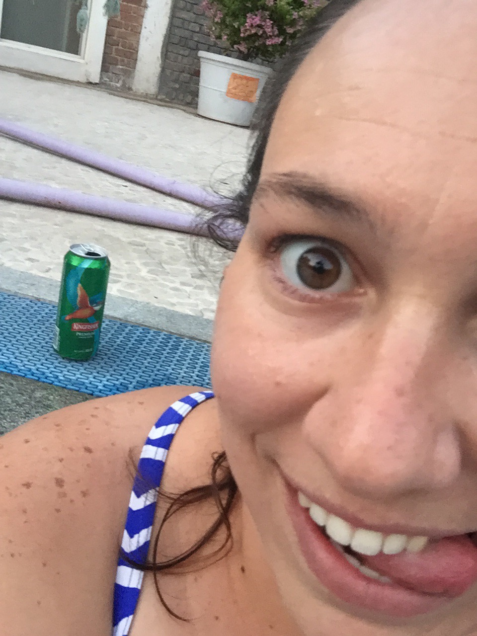 christa drinking beer at the pool